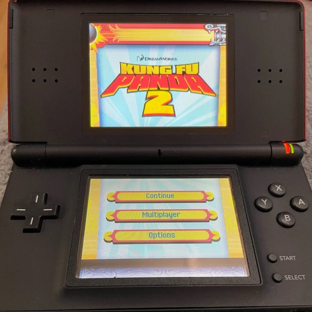 Nintendo DS Lite- excellent condition - comes with 13 games +